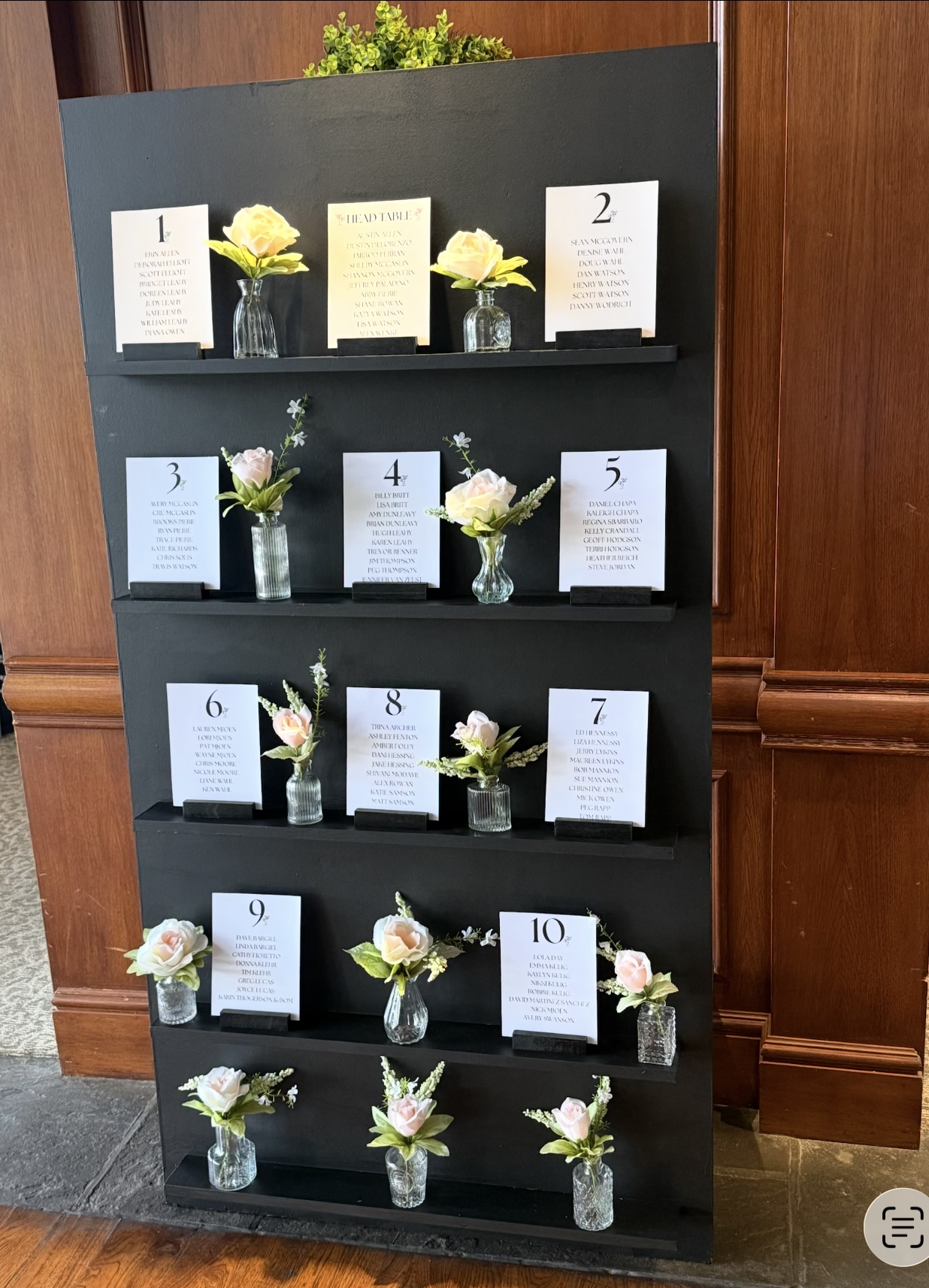 Black wooden seating chart stand — Bull Valley Golf Club